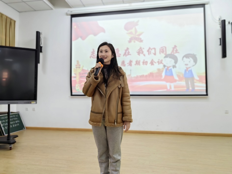 志愿者期初会议新闻稿_html_840b80c.jpg